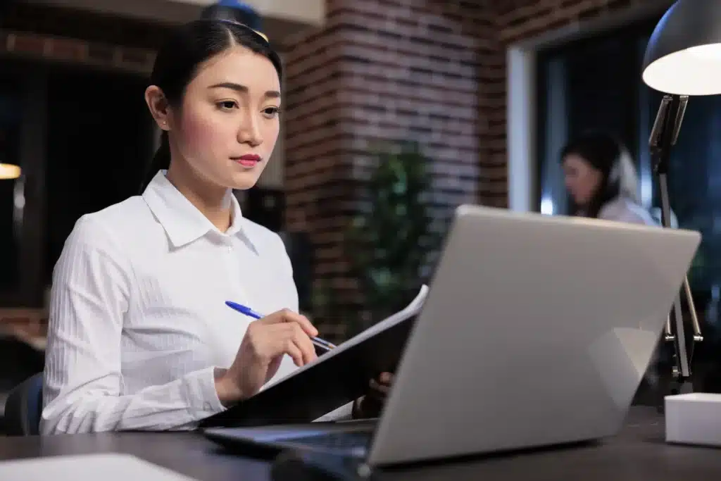 startup-project-manager-sitting-office-workspace-while-analyzing-accounting-data-confident-smiling-businesswoman-with-documentation-clipboard-reviewing-financial-documents (Web H)